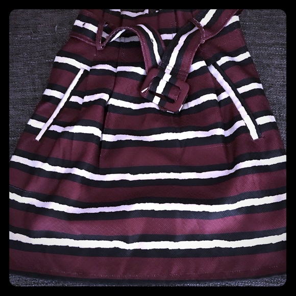 cutie Dresses & Skirts - NWT Adorable burgundy new mini skirt!
